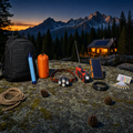 Ultimate Bug Out Bag contents: pack, water filter straw, emergency bivy, headlamp, crank radio, solar power bank, bracelet and water test kit